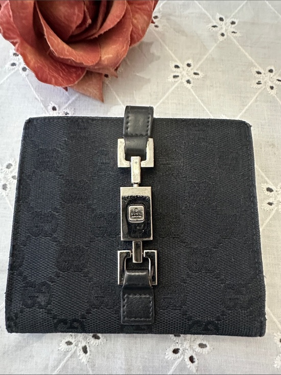 Gucci Handbags - Gucci Black Jackie Leather Bifold Wallet with Embossed Logo